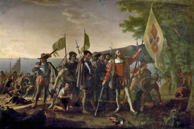 A classical painting depicting Columbus and his men landing in America, holding flags and a cross as they assert a claim over the newly discovered land, illustrating the historical moment referenced in the post.