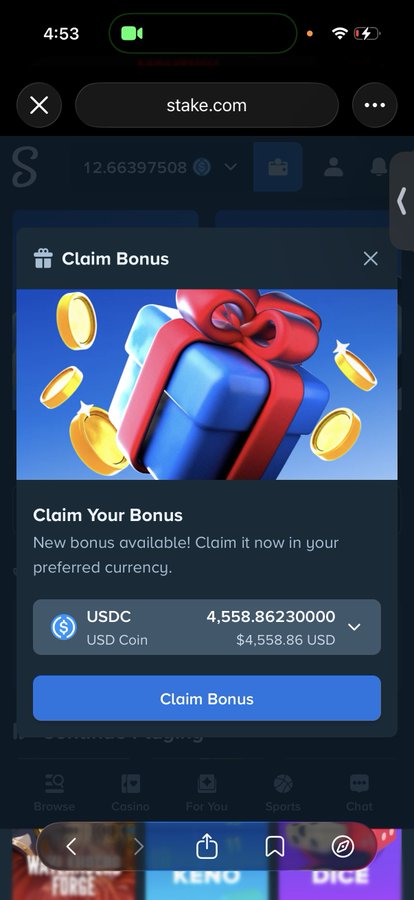 A mobile screenshot of stake.com displaying a "Claim Bonus" popup offering 4,558.86 USDC. This relates to the $100 Flash Giveaway post by showing the Stake platform's bonus claim feature, where users can claim rewards in currencies like USDT or USDC, likely relevant to participants of the giveaway.