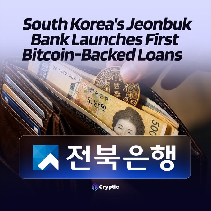 A header image features the headline "South Korea's Jeonbuk Bank Launches First Bitcoin-Backed Loans" above a photo of a hand holding a physical Bitcoin coin in front of Korean won banknotes in a wallet, with the Jeonbuk Bank (전북은행) logo and Cryptic branding displayed below.
