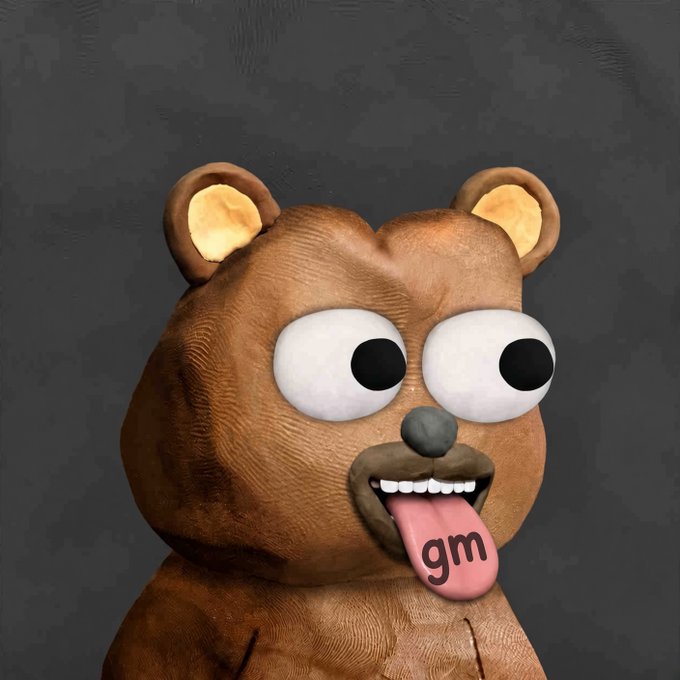 A 3D render of a stylized brown bear character with large googly eyes, a wide-open mouth, and its pink tongue sticking out showing the letters 'gm'.