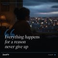 The image shows a woman sitting at home with her back facing the camera, looking out of a window that overlooks a city skyline. The text "Everything happens for a reason" is written above her head, while the words "Everything never gives up" are below her. This quote appears to be related to the post on social media where she has been tagged.