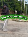 The image shows a person holding a sign that reads "The way you move" in a green banner design, promoting the streaming release of the song "The way you move" by LivingBestLife9 featuring MrZam, preshzinosongs, and NFT artists Sunage, Stake_N_Bake106, and Stone_XRPL. The sign serves as a promotional visual for the new music release being advertised in the post.