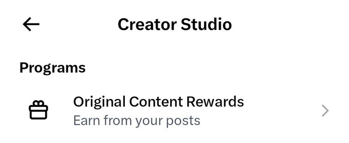 A mobile app screenshot of a 'Creator Studio' menu listing a 'Programs' section with an 'Original Content Rewards' option to 'Earn from your posts'.