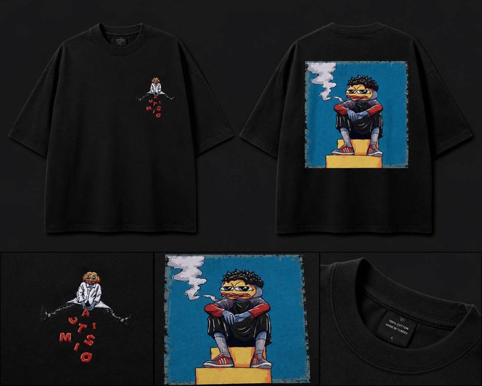 Product photography of a black t-shirt displaying two designs: a small chest logo reading 'A T I S M O' and a larger back graphic of a stylized figure with yellow sunglasses smoking, rendered in a painted style.
