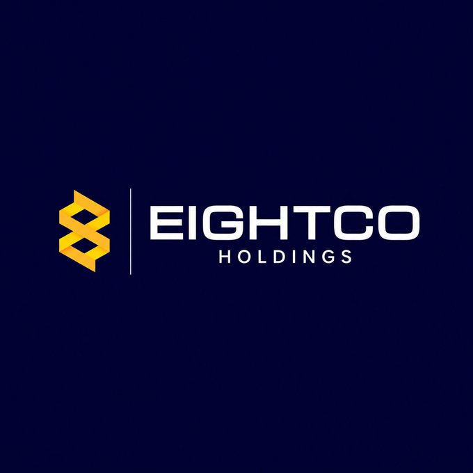 Eightco Holdings logo displayed on a dark navy background, featuring a gold geometric emblem next to the company name in white text.