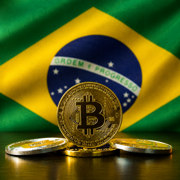 A golden Bitcoin token stands in front of the Brazilian flag, which displays the motto "ORDEM E PROGRESSO," symbolizing Brazil's push into tokenized finance as its banking giant Itaú partners to bring bonds and funds onchain.