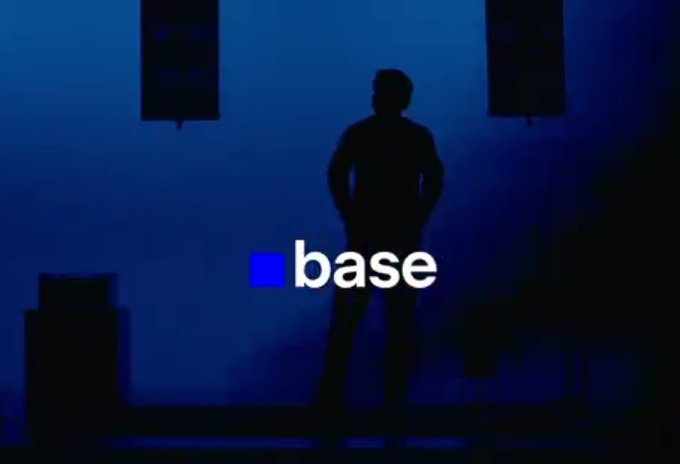 The image features a man standing against a blue background with white text that reads "Base Layer Season 2 has concluded". The caption below the photo states, "Focus on what is in the image and how it relates to the post", indicating that the image may be related to a discussion or analysis of the BaseLayer project.