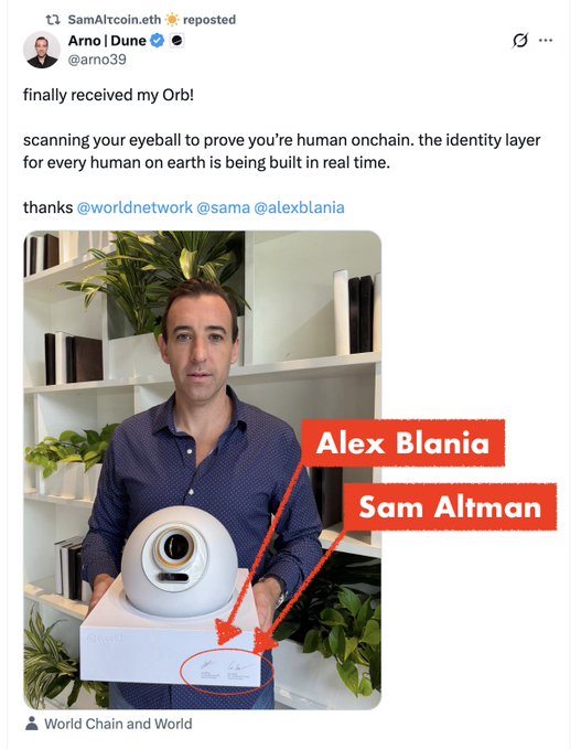 The image shows a man holding a white box with an orange dot, which appears to be a webcam or camera lens attachment. The text in the image reads "Finally received my Orb! Scans your eye ball prove you're human enchain. Identity layer for every human on earth is being built in real time. Thanks @worldnetworks @alexblania and @arno39".