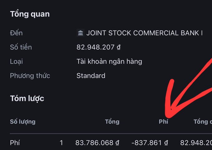 A Vietnamese-language crypto transaction receipt showing a Standard transfer from JOINT STOCK COMMERCIAL BANK for 82,948,207 đ, with a fee of -837,861 đ highlighted by a large red arrow.
