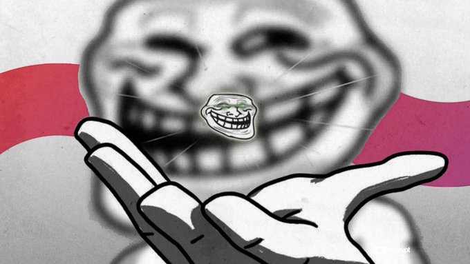 A blurry grinning troll face meme (popular "Trollface" character) looms in the background above an outstretched cartoon hand, while a smaller sharper troll face hovers above the palm set against a red ribbon—visually echoing the post's bullish "$TROLL" hype about the Troll token.