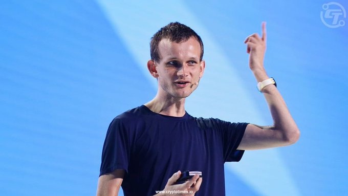iced coffee with a white lid, a blue shirt, and a watch on the wrist of an individual standing against a blue wall backdrop.