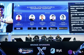 A panel discussion at a conference featuring five speakers seated on stage under a screen reading 'AI AGENTS, INFRASTRUCTURE & ENTERPRISE ADOPTION', with bronze sponsors StarShine, X18, ilyx, and LUMA listed below.