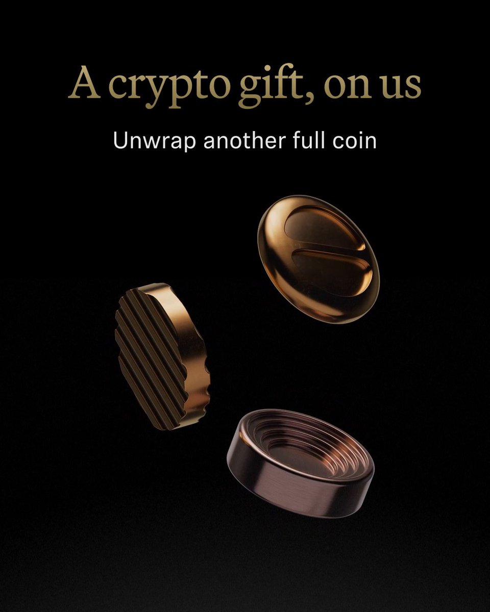 The image features a poster for Robinhood Gold rewards that includes three coins - two bronze and one silver. The text on the poster reads "A Crypto Gift, on us Unwrapping another full coin". This suggests that the poster is promoting an offer where users can exchange their existing coins for new ones in return for a cryptocurrency gift.