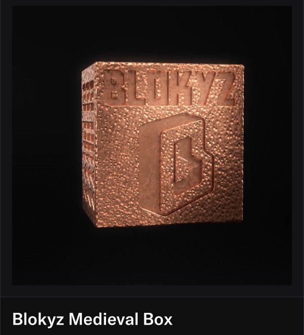 A textured copper-colored cube featuring an embossed "BLOKYZ" logo and a stylized "B" emblem on its face, identified by the caption as a "Blokyz Medieval Box." This showcases the first-phase release of @OriginalBlokyz collectible boxes, highlighting the rugged, medieval-inspired design.