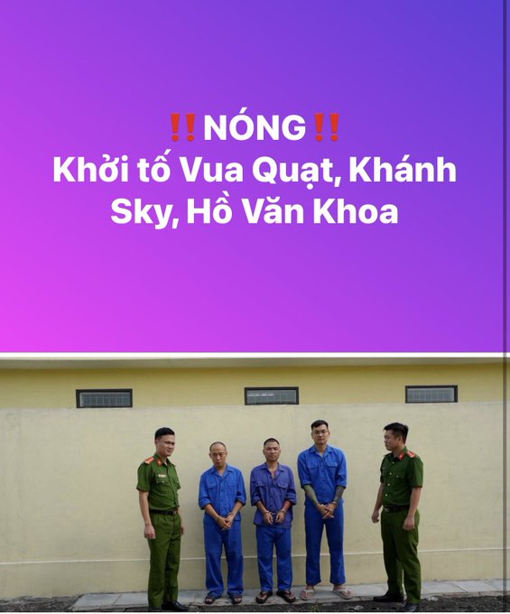The image shows four men in blue detention uniforms flanked by two police officers in green uniforms, standing against a wall. Vietnamese text at the top reads "!!NÓNG!! Khởi tố Vua Quạt, Khánh Sky, Hồ Văn Khoa" (meaning "Hot News: Prosecution of Vua Quạt, Khánh Sky, Hồ Văn Khoa"), relating to the post's reference to "Brother Fan" (likely referring to Vua Quạt, a known figure) being prosecuted or taken away.