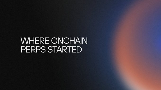 A dark screen with the text 'WHERE ONCHAIN PERPS STARTED' in white, accompanied by a blurred orange and blue circular glow on the right side.