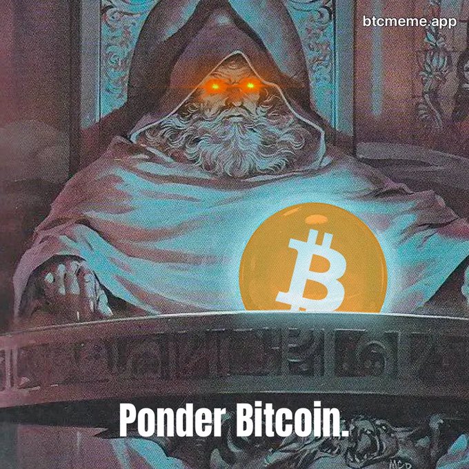 A fantasy illustration of a hooded wizard with glowing orange eyes gazing into a glowing Bitcoin crystal ball, captioned 'Ponder Bitcoin.' with watermark 'btcmeme.app'.