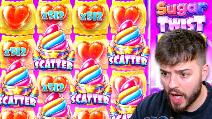 A man with a surprised expression reacts to a "Sugar Twist" slot game screen displaying multiple scatter symbols and x512 multipliers, likely highlighting a big win moment tied to the $25 Stake.com giveaway promotion.