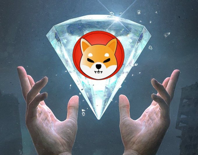 A digital artwork depicting two hands reaching up toward a glowing diamond containing the Shiba Inu (SHIB) token logo against a dark background.