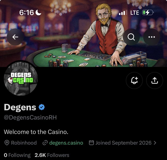 A mobile screenshot shows the Degens Casino Twitter/X profile (@DegensCasinoRH), displaying their animated header of a casino dealer at a card game, with 2.6K followers and a bio stating "Welcome to the Casino" on Robinhood. The accompanying post promotes the project's play-to-earn casino launch featuring an NFT membership system and $DEGEN token chips, with details on the 2,222 supply and Robinhood chain integration.