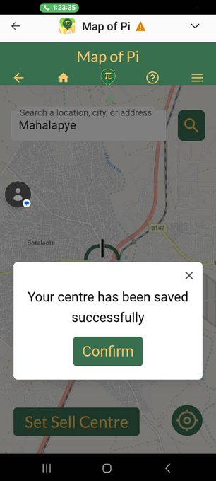 Screenshot of the 'Map of Pi' app with a successful save confirmation dialog reading 'Your centre has been saved successfully' and a 'Set Sell Centre' button at the bottom.