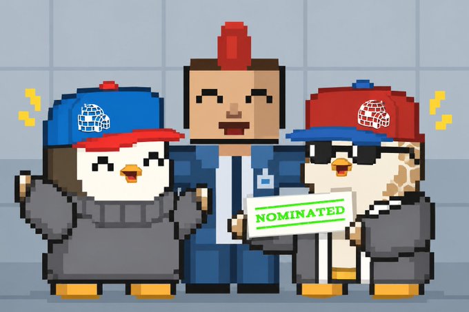 Pixel art illustration showing a person in the center flanked by two penguin-like characters wearing caps, holding a 'NOMINATED' sign, with a small UFO-like character floating above.