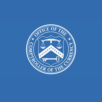The image displays the blue flag of the U.S. Office of the Comptroller of the Currency (OCC), featuring its circular seal with scales of justice and the text "Office of the Comptroller of the Currency." The flag visually represents the federal regulator that conditionally approved World Liberty Financial (WLFI) for a national trust bank charter, as noted in the accompanying post.