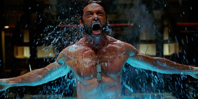 A cinematic still shows a muscular man with dog tags screaming while emerging from water, with water splashing dramatically around him in a dark setting.