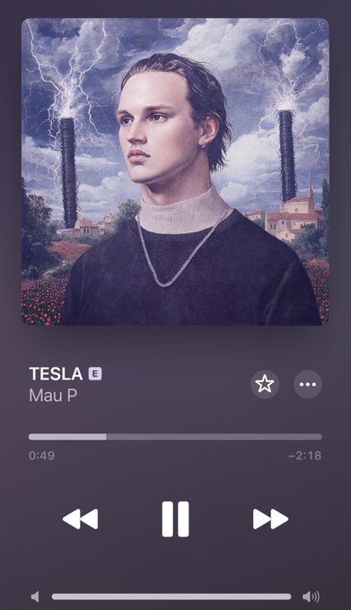 A music player interface displaying the song 'TESLA' by 'Mau P' with a portrait of a young man wearing a necklace, set against a dramatic sky with lightning and tower-like structures in the background; the track is paused at 0:49 with -2:18 remaining.