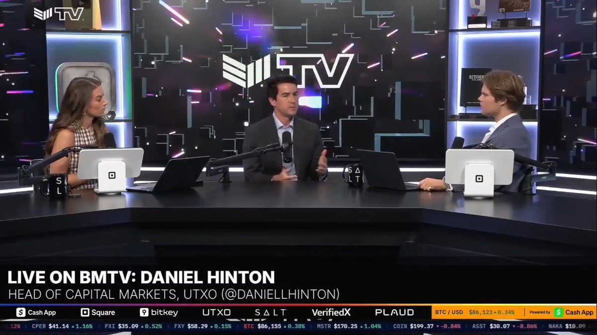 A BMTV broadcast features an interview with UTXO Management's Head of Capital Markets Daniel Hinton (@daniellhinton), who predicts Bitcoin is entering a bull run with prices potentially reaching the mid-$90s to low $100,000 range within 3-6 months. The on-screen ticker displays BTC/USD at $86,123 (up 0.34%), contextualizing his optimistic price forecast.