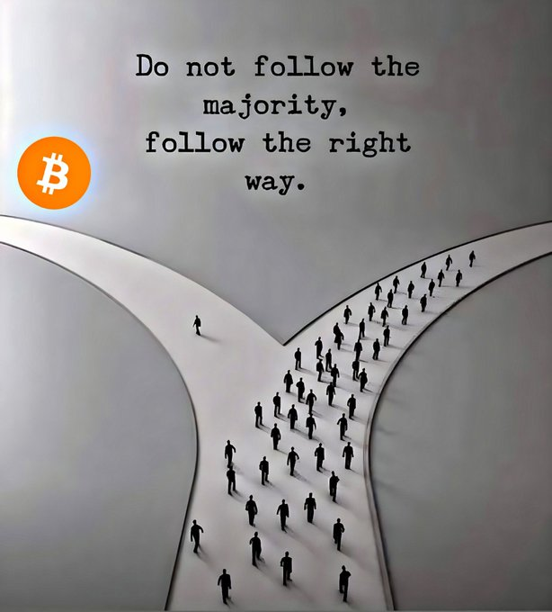 An inspirational image showing a crowd of silhouetted figures walking along a path that splits, with the text 'Do not follow the majority, follow the right way' and a Bitcoin logo in the corner.