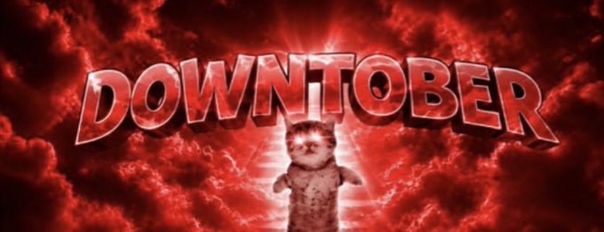 Graphic with dramatic red cloudy background featuring the text 'DOWNTOBER' in bold letters with a small cat image in the center.