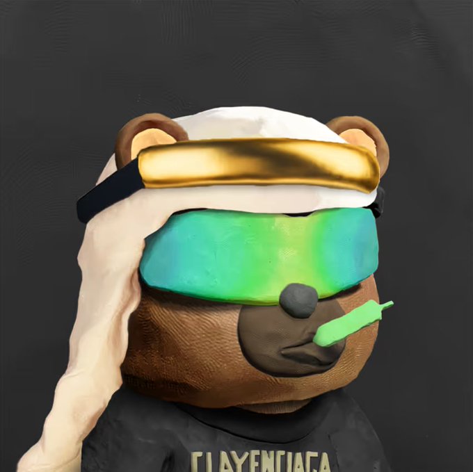 A claymation-style teddy bear wearing a white keffiyeh and gold visor sports green-tinted sunglasses while holding a green popsicle, with a "PLAYENTIACA" shirt visible—fitting the "clay day" theme through its sculpted, handcrafted aesthetic.