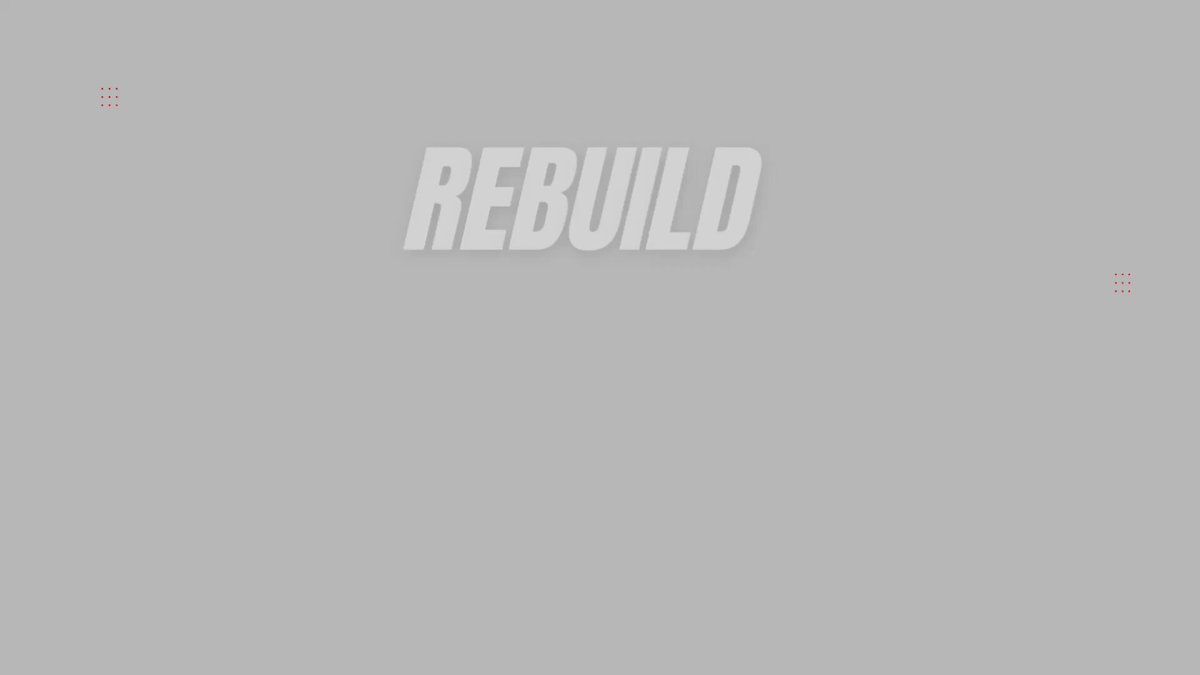 The image shows a gray banner with white text that reads "REBUILD" written in bold letters. Below this, there are three red dots scattered across the banner. The background of the image is a light brown color.