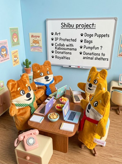 A 3D-rendered playful scene of Shiba Inu dogs gathered around a table with laptops, in front of a whiteboard titled 'Shibu project:' listing items like 'Art', 'IP Protected', 'Doge Puppets', 'Bags', and 'Donations'.