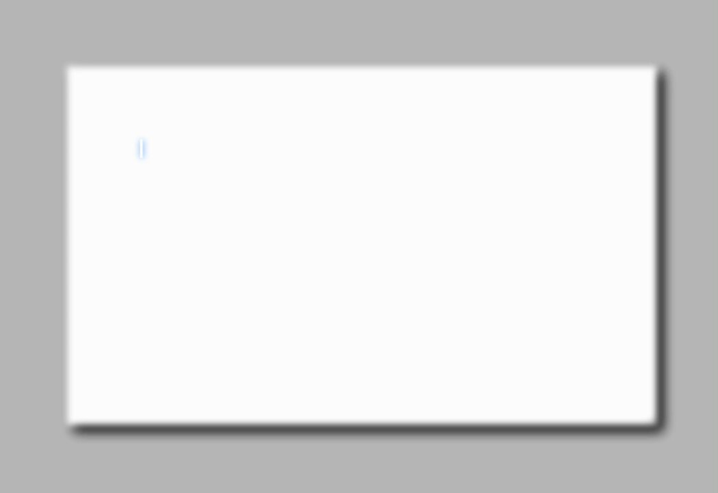 The image shows a white square with a blue dot in the center, which appears to be a logo or a symbol. The background color of the image is gray, providing contrast to the white square. There are no other objects or texts present in the image. The focus on this specific object and its position within the frame suggests that it might be related to the post about creating a document out of focus.