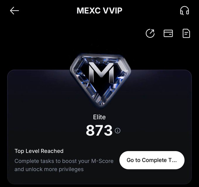 A MEXC VVIP screen showing an Elite tier status with an M-Score of 873 and a diamond-shaped blue M logo, prompting the user to complete tasks to unlock more privileges.