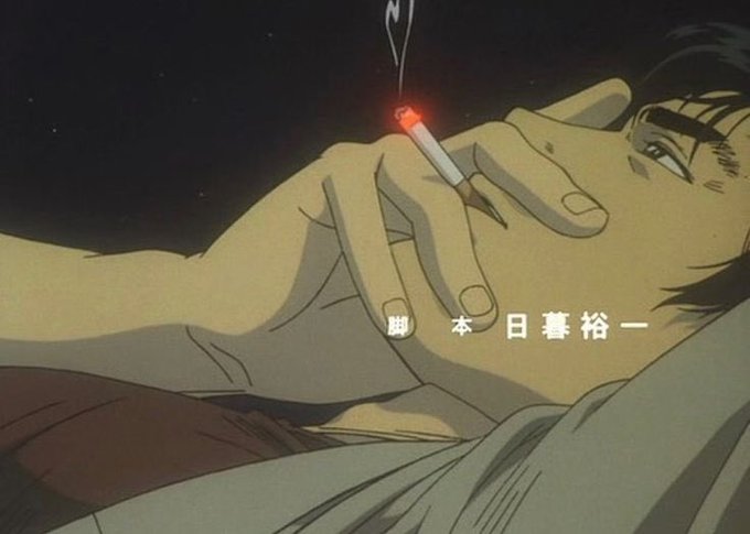 An anime still of a dark-haired male character smoking a cigarette, with Japanese text reading '脚本 日暮裕一' (Screenplay: Yuichi Higurashi) overlaid on the image.