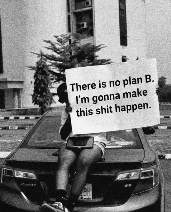 A black and white image showing a person sitting on the trunk of a car holding a large white sign that reads 'There is no plan B. I'm gonna make this shit happen.'