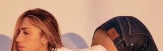 A cropped close-up of a woman's face next to another person bent over wearing jeans.