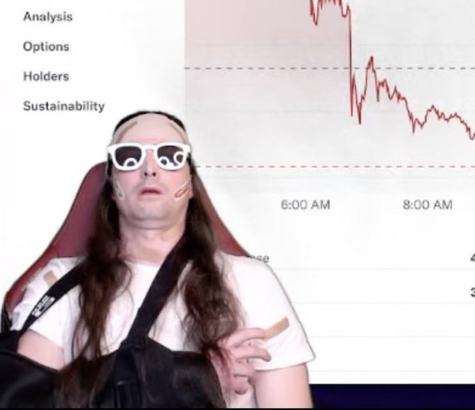 The image features a man wearing sunglasses, sitting in a chair with his arm outstretched as if he's about to make a gesture or pose for a photo. The background of the image shows a graph that displays a downward trend, possibly indicating a decrease in stock prices over time. The caption on the post reads "Que dios proteja a los holders de $XRP", which translates to "Who is this guy?".