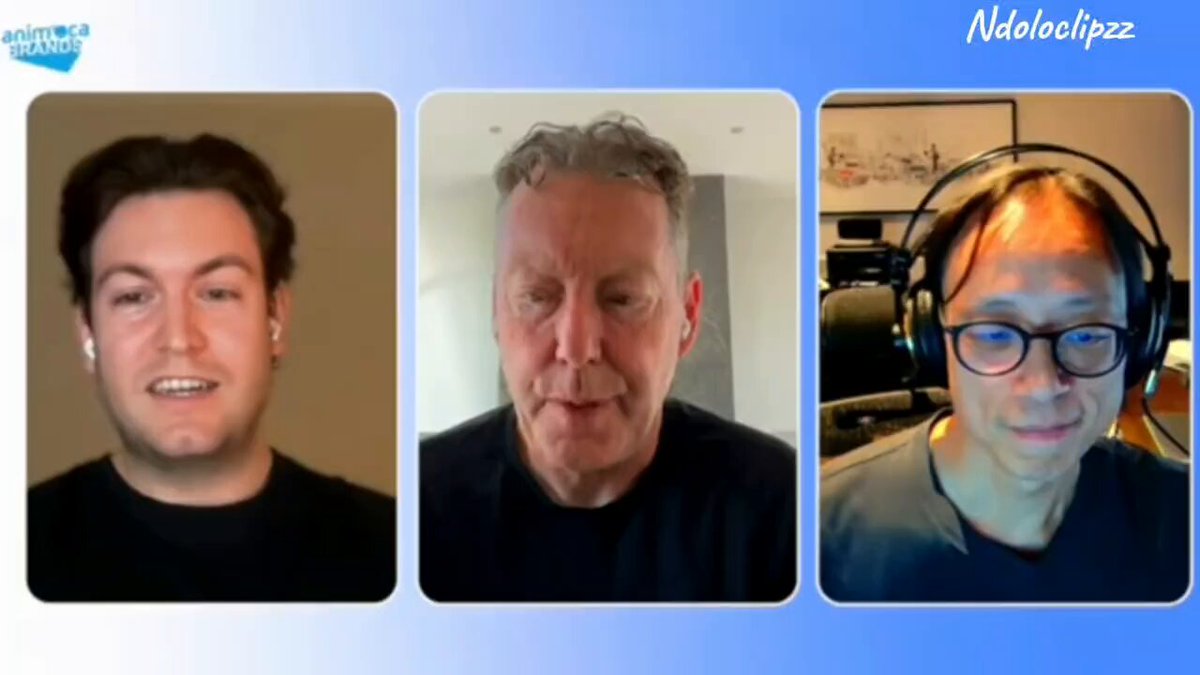 The image shows three men with headphones on their heads, each wearing a different colored shirt - black, blue, and gray. The background of the image is white, which contrasts with the colorful shirts worn by the men. The caption below the image reads "Focus on what is in the image and how it relates to the post."