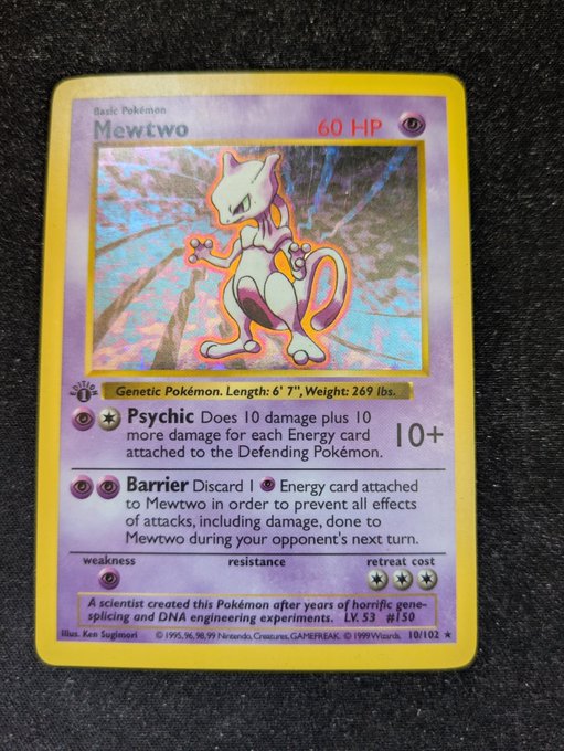 A holographic Mewtwo Pokémon trading card from the Base Set (#10/102) with 60 HP, featuring the attacks 'Psychic' and 'Barrier'.