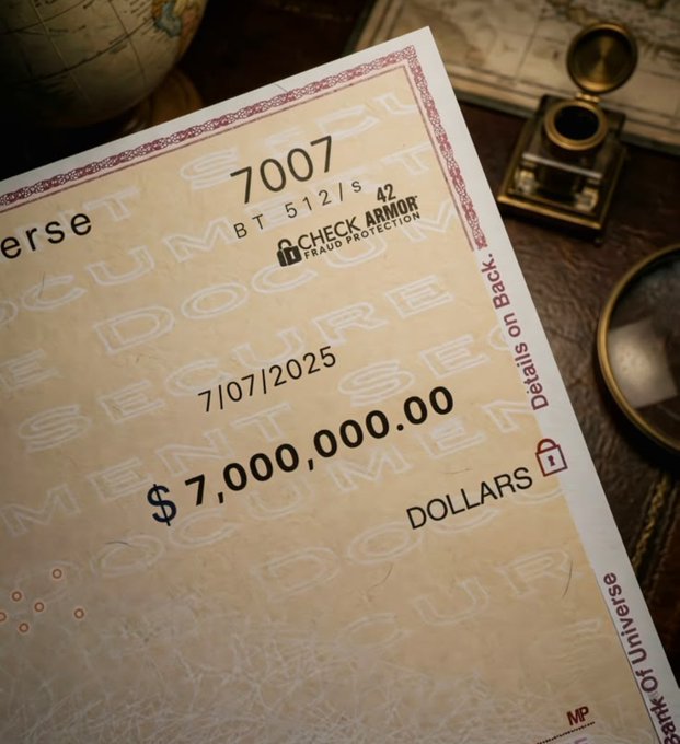 A close-up of a novelty bank check dated 7/07/2025 for $7,000,000.00 DOLLARS from 'CHECK ARMOR FRAUD PROTECTION', referencing 'Bank of Universe' and 'Jeremiah, United States'.