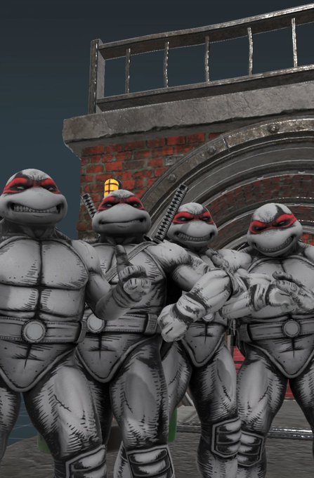 Four Teenage Mutant Ninja Turtles statues stand together in front of a brick building, humorously posed to play a prank on passersby. The image ties into the post's "#justkidding #madeyoulook" theme by suggesting a playful surprise.