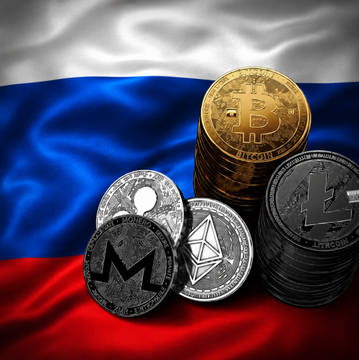 A stack of Bitcoin, Litecoin, Monero, and Ethereum coins sits against the Russian flag, symbolizing Russia's recent ban on cryptocurrency mining in Moscow and surrounding regions until 2032 due to power grid strain.
