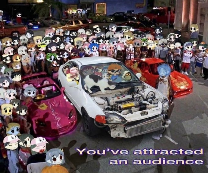 An anime meme showing cartoon character faces photoshopped over a crowd gathered around modified cars at night, with the caption 'You've attracted an audience'.