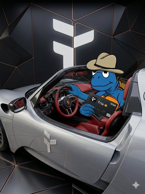 The image features a cartoon frog holding a wallet that says "TRI" on it while sitting inside a car with a steering wheel. The scene appears humorous as if the frog is telling a joke or giving advice about managing his finances, possibly suggesting 50% off fees for using TRI in the app through text overlays within the image.