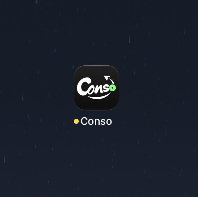 An app icon for 'Conso' featuring a stylized white smiley face design on a dark square background with a yellow dot.