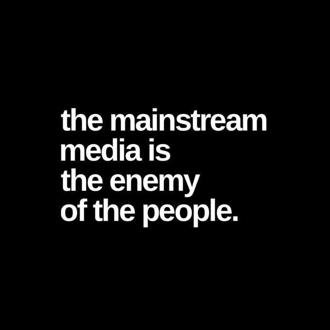 A black graphic features white text reading, "the mainstream media is the enemy of the people," a phrase famously used by Donald Trump.